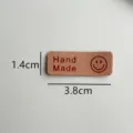 Handmade leather label with cute smiley face, beige color, 3.8x1.4cm DIY clothing accessory. - Smiley Face / 3.8x1.4cm / Tan