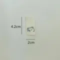 Handmade woven cloth label with cute bear pattern, folded garment tag for hats and scarves. - Bear Label #06
