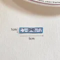 Blue woven label DIY clothing accessory with bow pattern and size 1x5cm for handmade crafts. - Blue Border Bow Style (zm773)
