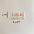Handmade woven clothing label patch, 2x5.2cm DIY sewing accessory for bags and garments. - Colorful Handmade