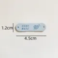 Handmade leather label tag with holes heart knitting pattern DIY craft accessory 4.5x1.2cm - Heart Handmade Leather Label / Sky Blue