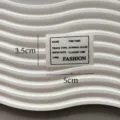 White custom clothing fabric label tag with stylish English letter print, 3.5x5cm size. - Fashion Small Label