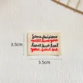 Cotton woven label embroidered patch for clothing DIY crafts, sewing decoration, size 3.5x5.5cm. - YM Black and Red Text