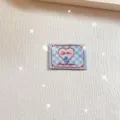 Embroidered fabric patch detail with blue plaid pattern and cute pink heart design for DIY. - Heart Bow (zm644)