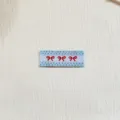 Korean style cute bow embroidered fabric label for clothing decoration and DIY handmade crafts. - zm861