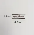 Detailed view of the cute bear embroidered clothing label measuring 1.4x4.2cm for DIY sewing crafts. - Little Bear (zm493)