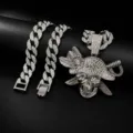 Detailed view of hip hop silver rhinestone pirate skull pendant necklace with cuban link chain. - Pendant with 18inch Cuban Chain / Silver