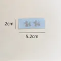 Cute light blue woven fabric label with shiny silver balloon dog pattern for DIY clothing 2x5.2cm - Two Dogs