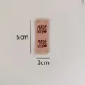 Pink faux suede handmade label with embossed heart text, ideal for DIY crafts and hats. - Rectangle 05