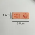 Cute smiley face leather label for handmade DIY sewing, hats, scarves, bags and clothing decoration. - Smiley Face / 3.8x1.4cm / Light Pink