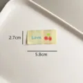 Écusson thermocollant tissé DIY fait main avec un joli motif de cerises et de broderie. - zm030