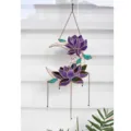 Close-up detail of hanging acrylic purple lotus flower and crescent moon suncatcher - Moon Lotus