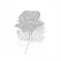 Detailed close-up of silver rhinestone rose brooch, sparkling crystal petals and cutout leaves. - Silver