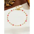 Collana in acciaio inossidabile dorato con pietre rosse e perline dorate, stile chic. - Cavigliera Quadrata con Perline Rosse / Oro