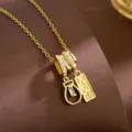 Elegant minimalist gold necklace with sparkling zircon double pendants, unique niche jewelry piece. - Perfume Bottle Ticket Style (T2326)