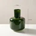 Dark green glass vase detail shot showing narrow neck and round body, 24.5cm height for decor. - 1824 Green
