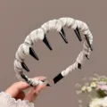 Checkered tooth headband detail showcasing fabric-wrapped design and anti-slip teeth for daily wear. - Coffee