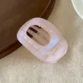 Pearl jelly pink flat oval hair claw clip, translucent shimmer shark clip detailed view. - Ellipse / Pink