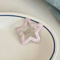 Close-up detail of a sweet pink plaid star hair clip, cute hair accessory for daily styling. - Striped Star Clip