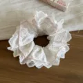 White polka dot lace scrunchie with cute pink trim and elegant design for daily wear hair tie accessory - Pink Cinched Scrunchies