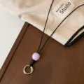 Cordón de gafas de cuero negro estilo coreano con cuenta morada y anillo plateado. - Cuenta Púrpura