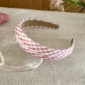 Close-up detail of the sweet pink and white plaid fabric headband, showing fine texture. - Geometric #5