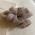 Leopard print organza hair scrunchie detail view, fluffy sheer fabric ponytail accessory. - Light Coffee