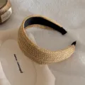 Detailed view of the Korean vintage knitted wide hair hoop, straw texture and chic style. - Khaki