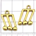 Pendentifs notes de musique en alliage or ancien, charms de notes pour bijoux DIY. - Note de Musique (20891)