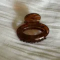 Brown tortoiseshell oval hair claw clip for women, elegant acetate hair accessory for half updos. - Brown