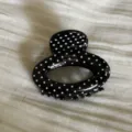 Black and white polka dot oval hair claw clip detail, stylish acetate small hair accessory. - Black Polka Dot