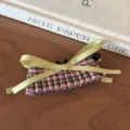 Sweet Korean style plaid ruffled bow hair claw clip detail shot showcasing fabric pleats. - Pink and Green Plaid