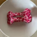 Pink bone shaped hair claw clip detail view, cute polka dot hair accessory for daily styling - Pink Leopard Print Bone