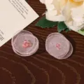 Primer plano de pétalos de flor de malla rosa con cuenta de cristal para accesorio. - Rosa Loto