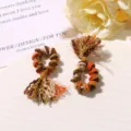 Colgantes de borlas de hilo mini hechos a mano manualidades dijes tejidos coloridos. - Marrón y Naranja