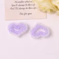 Detalle de accesorios DIY de corazon de cuentas moradas y transparentes, ideales para el cabello. - Púrpura