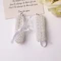 Detailed view of white pearl beaded DIY charm accessory with ribbon and metal ring. - Pearl, 1 Piece