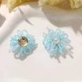 Vista detallada de flor de fuegos artificiales con cuentas para excelentes accesorios de bricolaje. - Azul cielo