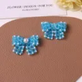 Handmade blue beaded pearl bow DIY accessories for earrings, hair pins and shoe charms. - Blue