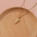 Golden spiral shell pendant necklace for women, minimalist stainless steel clavicle chain. - Gold