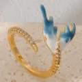 Gold stainless steel open ring with blue drip oil antler and sparkly cubic zirconia stones. - Blue