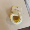 Detailed view of sweet candy-colored Korean style high elasticity hair ties set for daily use. - 4 Piece Set / Yellow Series