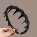Detailed close-up of a black denim wrapped hair hoop with plastic teeth, versatile hair accessory. - Handmade Wrapped Style / Black