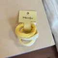 Detail shot of candy color hair ties set, high elasticity elastic hair bands for sweet daily wear. - Set of 5 / Yellow Series