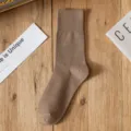 Khaki women's solid color mid-tube cotton socks, ideal for spring and summer daily casual styling. - One Size / Coffee