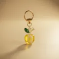 Acrylic electroplated apple bag charm keychain, stylish gold metal ring for women gift. - Yellow