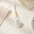 Cute ghost heart keychain detail showing resin pendant, white lanyard, and metal bell charm. - White