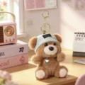 Cute scented plush bear keychain pendant, detailed view of fluffy bag charm doll. - Scented Plush Bear - Light Green Hat