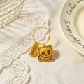 Detailed view of cute yellow leather cat keychain with exam success blessing tag for students. - Yellow (Success in Exams)