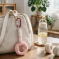 Pink grip ring hand exerciser bag pendant, portable decompression keychain and cute hanging ornament. - Pink